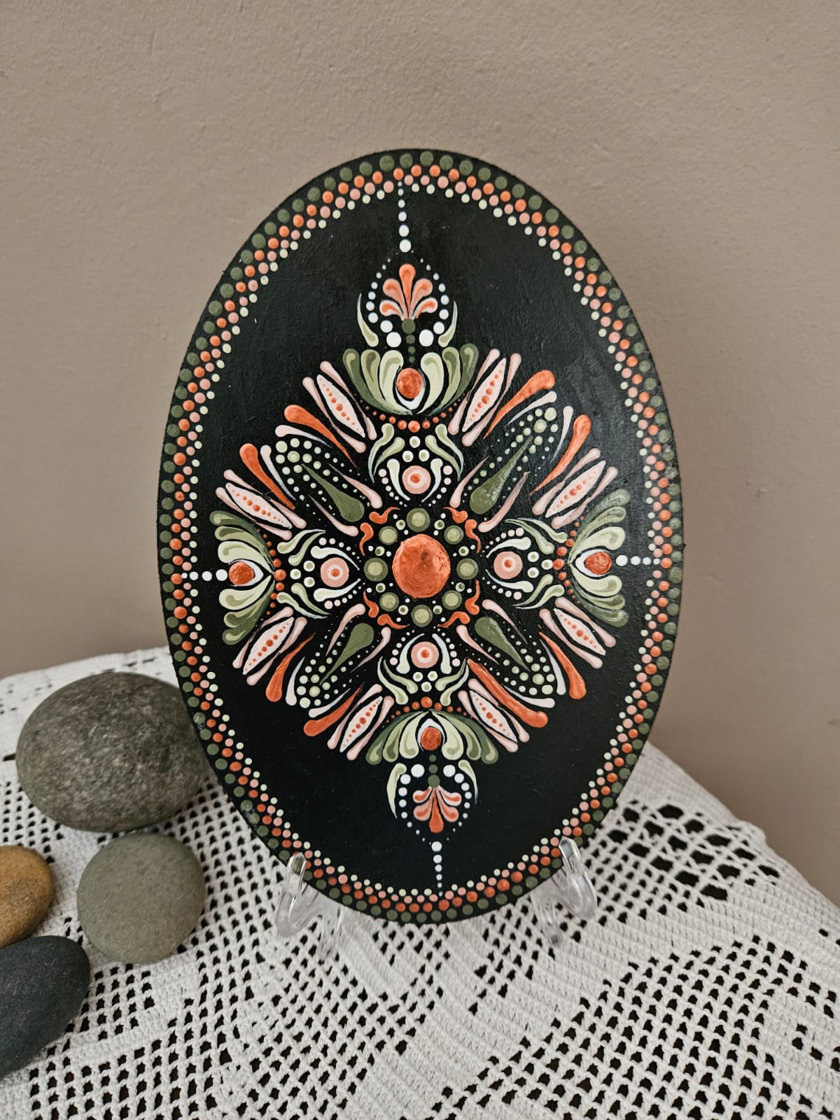 Oval orange and green mandala